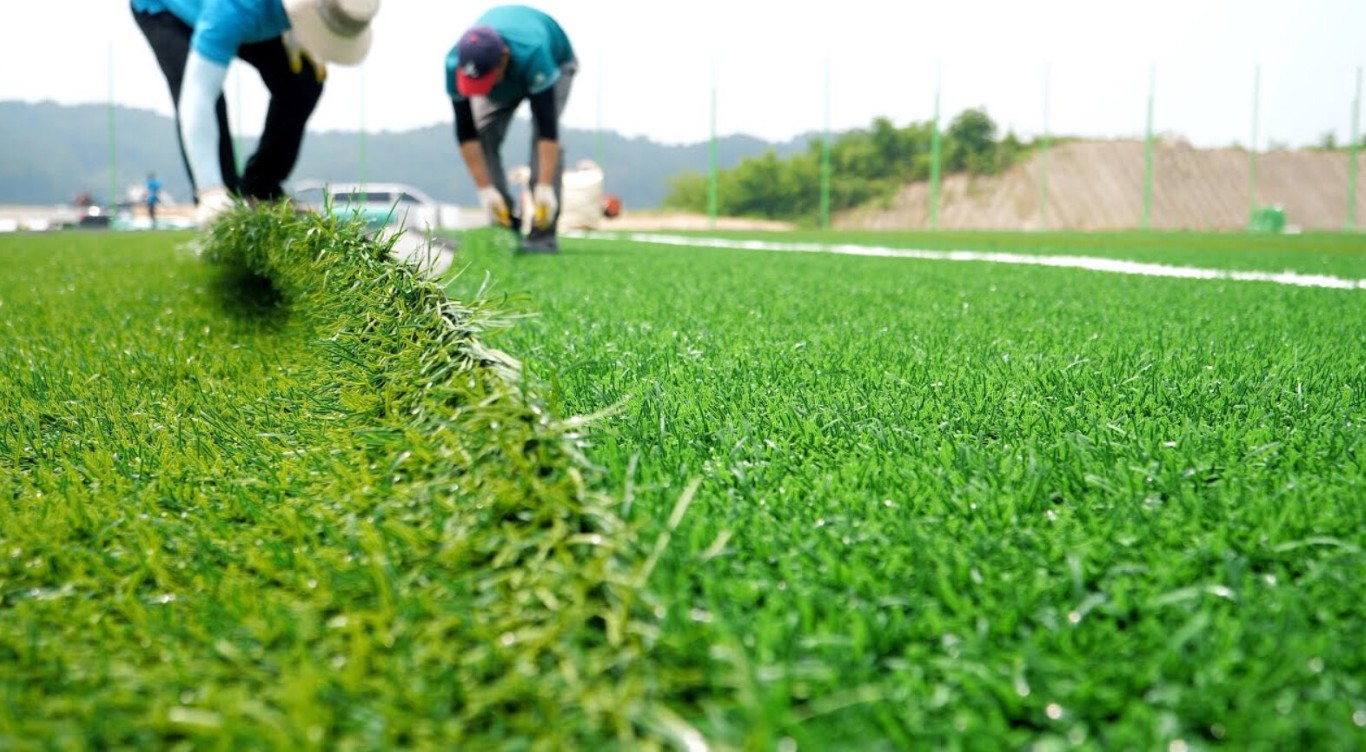Commercial artificial grass installation for business property